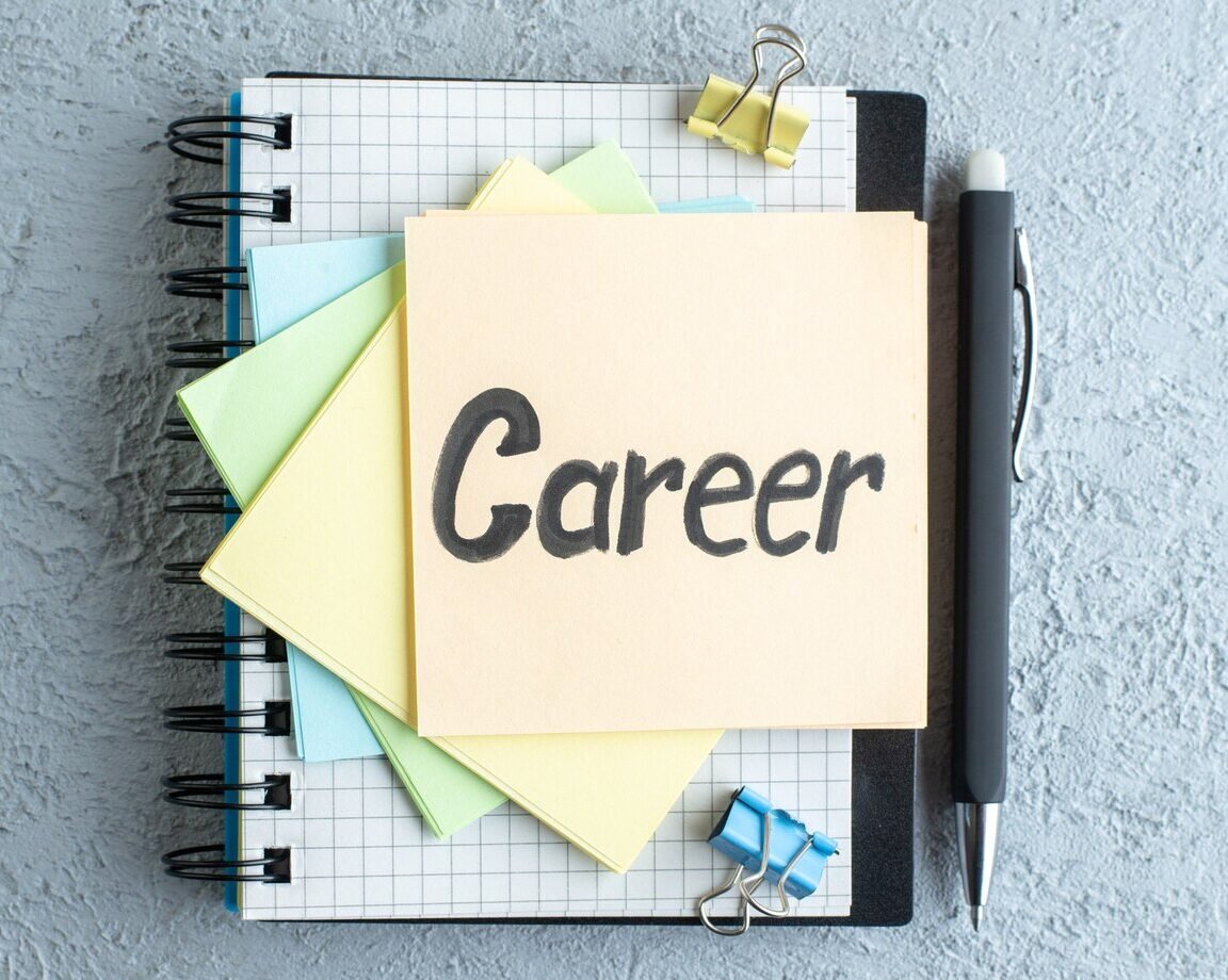 top-view-career-written-note-with-stickers-notepad-white-surface-job-office-school-copybook-salary-college-business-color_179666-19735